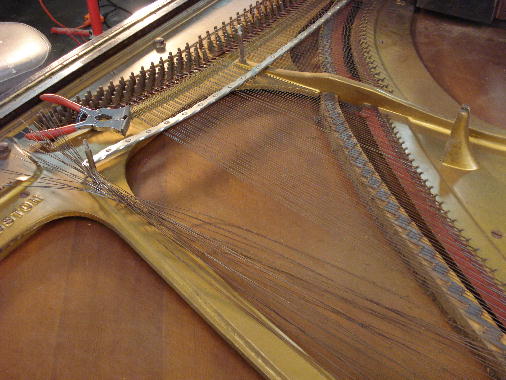 24 - Treble strings removed 24 - Treble strings removed